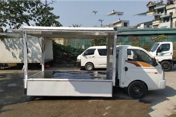 Xe tải thùng cánh dơi